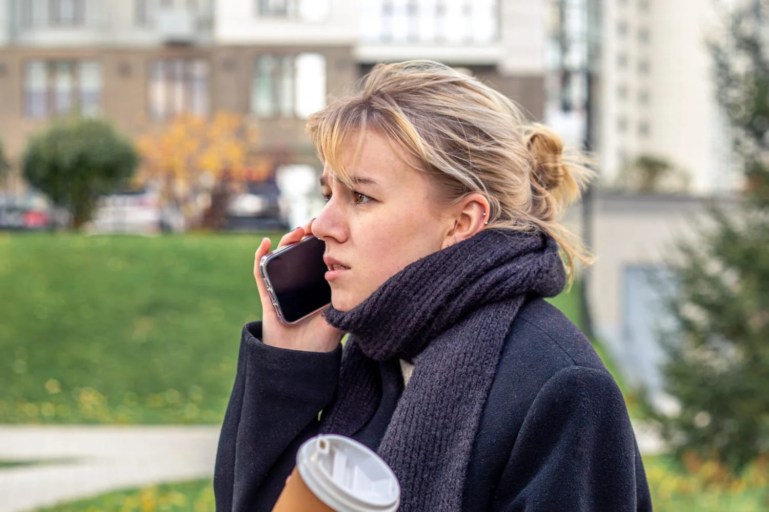 A woman locked out after buying coffee, calling a locksmith