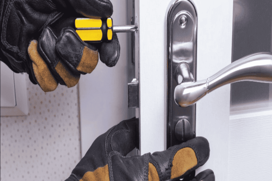 Professional locksmith fixing door