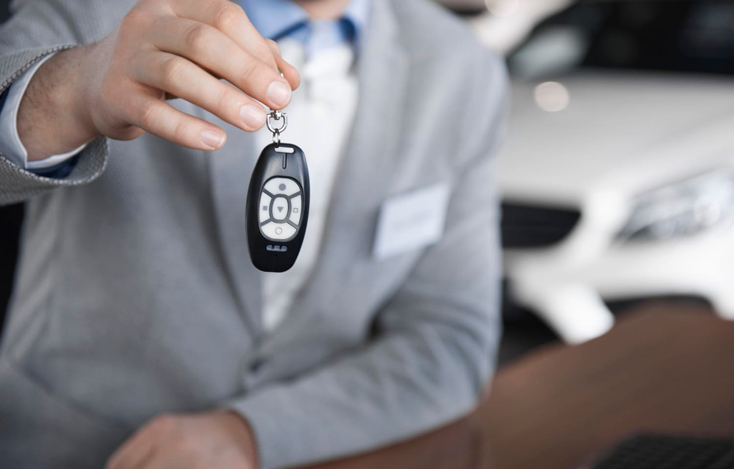 Salesman with car key