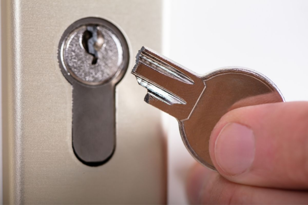 Locksmith holding a broken key