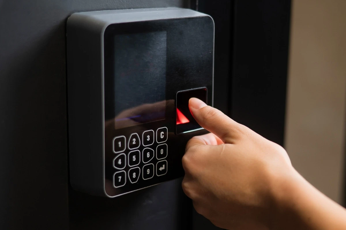 Fingerprint access control system securing a commercial building door 