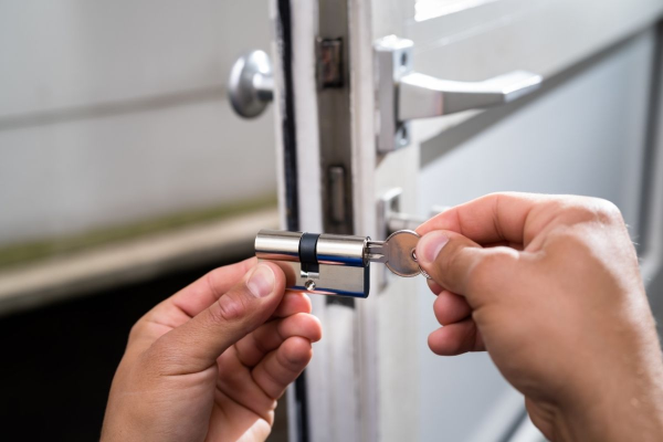 1.-Commercial-locksmith-performing-lock-repair-service.webp